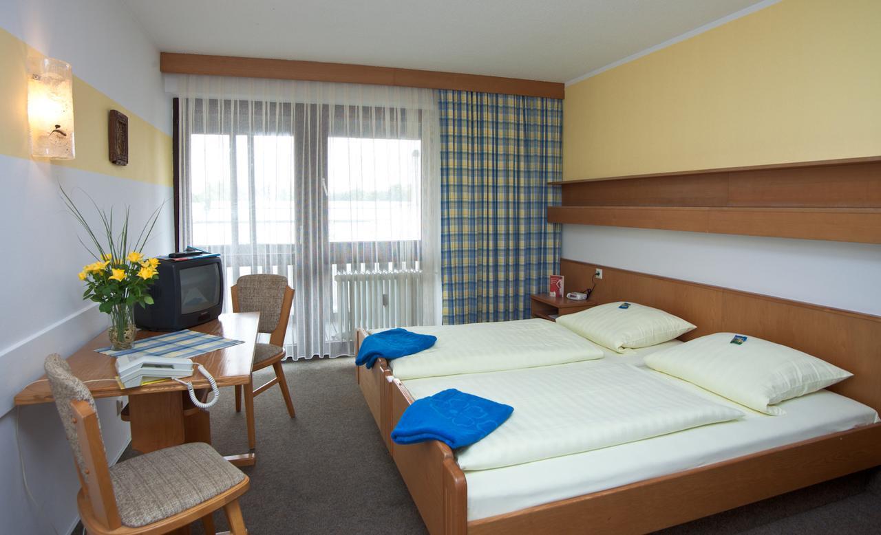 Hotel Am Regenbogen Кам Екстериор снимка